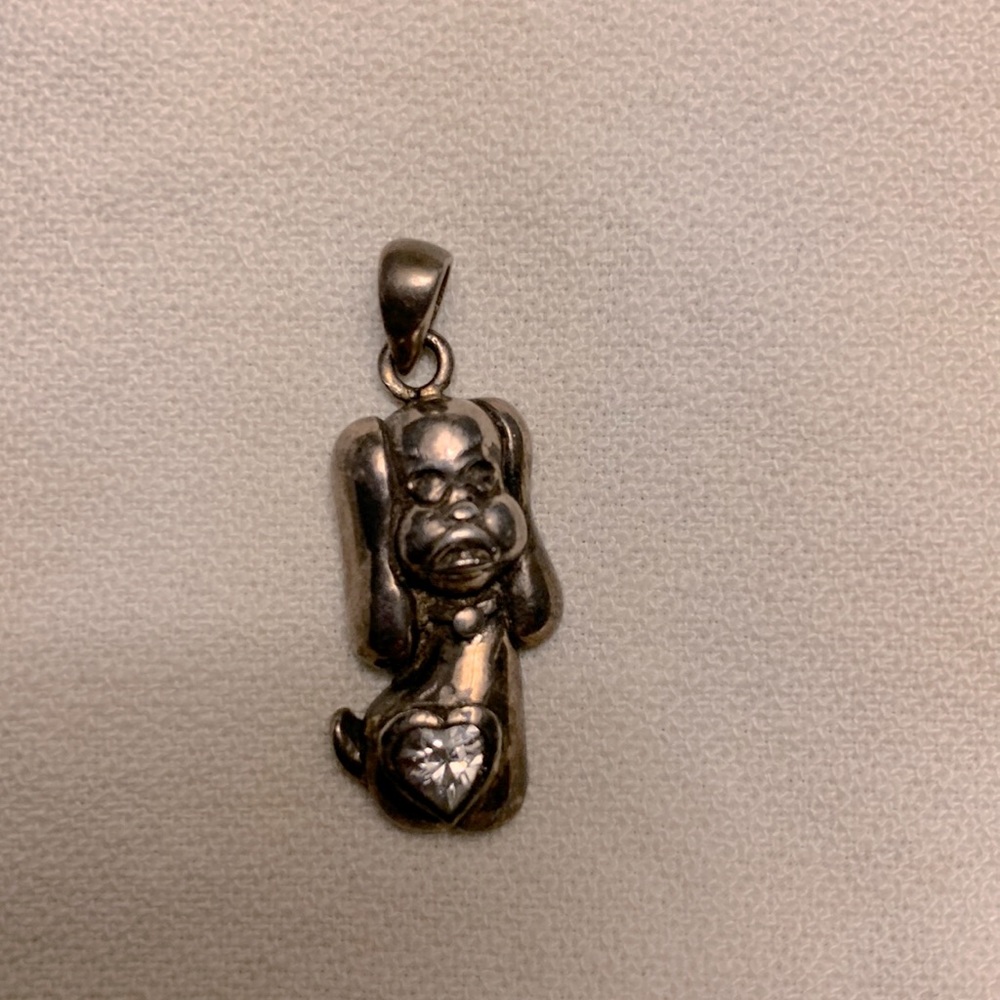 Silver toned dog pendant